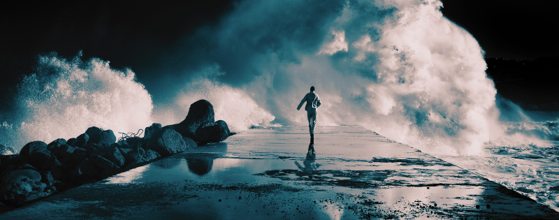 Person running during difficult time representing faith during trauma