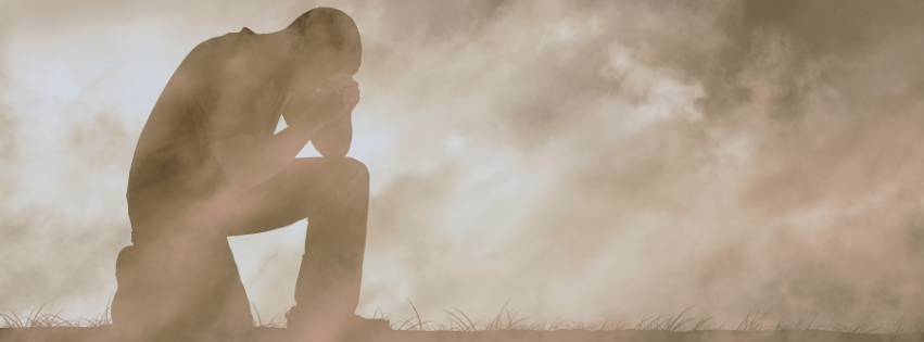 Person sitting contemplatively representing the tension between faith and doubt, holding both pain and God's promises