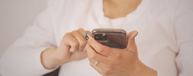 Person unfriending someone on social media representing echo chamber formation and protecting your peace