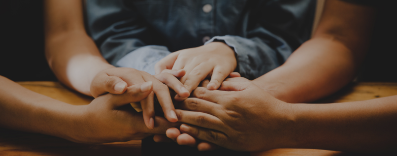 spiritual warfare for parents; family praying for protection together