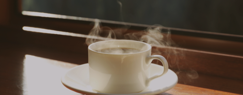 Woman with coffee taking quiet time to reconnect with God