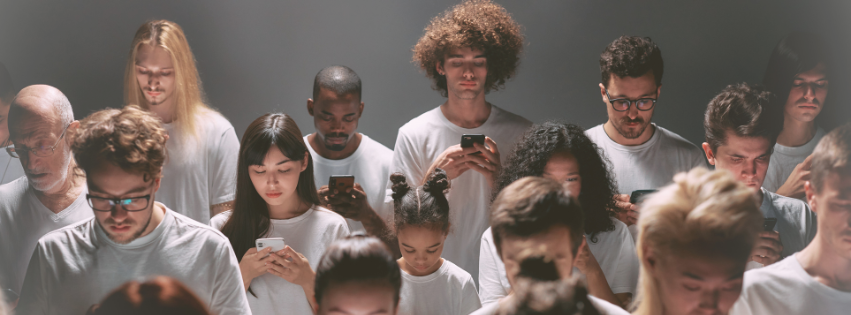 Reaching for a phone in a crowd instead of sitting in silence — social media and attention